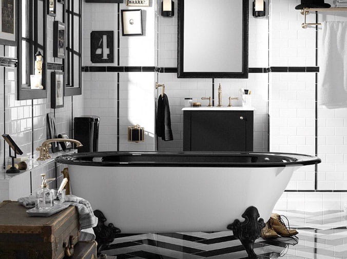 Black and white bathroom with free standing bathtub